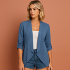 Women’s crochet cardigan in blue with open front, airy and comfortable for casual and bohemian outfits.
