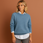 Women’s oversized casual sweater in blue with minimalist design, soft and comfortable for casual and stylish outfits.