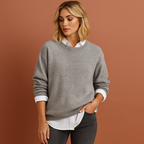 Women’s oversized casual sweater in gray with minimalist design, soft and comfortable for casual and stylish outfits.