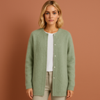 Women’s oversized cardigan in green with minimalist design, soft and comfortable for casual and stylish outfits.
