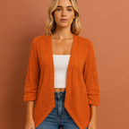 Women’s crochet cardigan in orange with open front, airy and comfortable for casual and bohemian outfits.