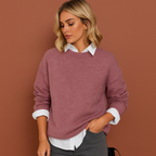 Women’s oversized casual sweater in pink with minimalist design, soft and comfortable for casual and stylish outfits.